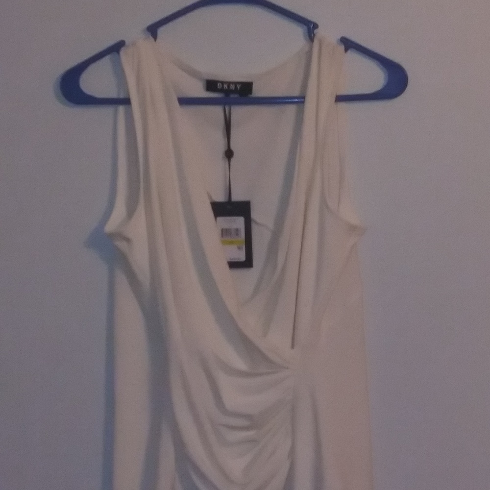 Sleeveless cream shirt